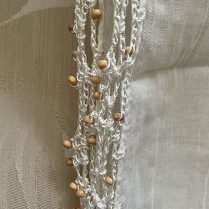 Rectangular scarf embellished